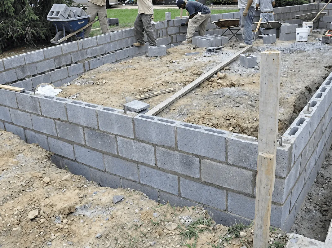 Professionals building a foundation with blocks in Hollywood, FL