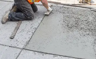 Professional repairing a concrete floor in Hollywood, FL