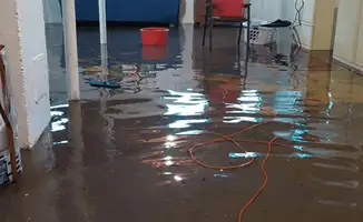 Basement with boiler, cabinets and washing machine completely flooded in Hollywood, FL